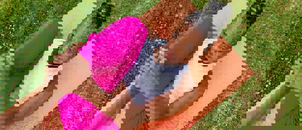 Lady Performing Yoga On Mat