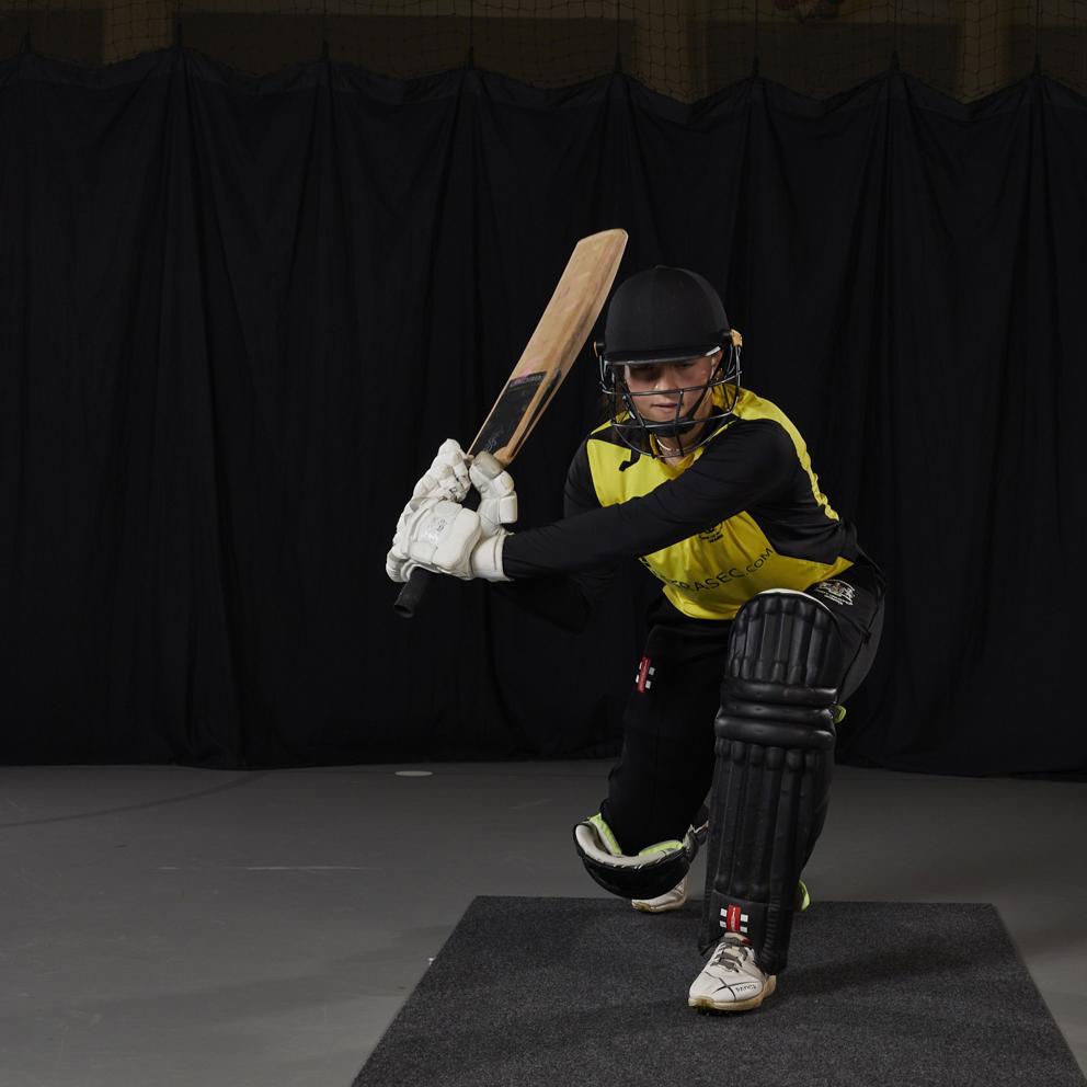 Player Kneeling Down With Cricket Bat1