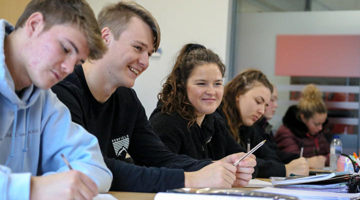 College Students In Classroom